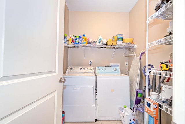 17 Misty Meadow Rd Unit 17, Windham, NH 03087 - laundry area featuring washing machine and clothes dryer and light tile patterned floors