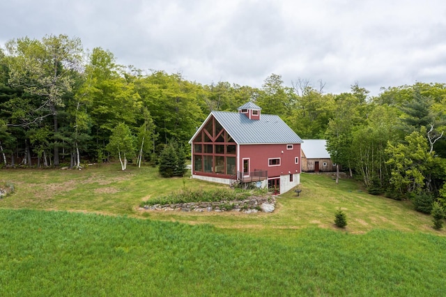 938 Stigers Rd, Andover, VT 05143 - view of home's exterior featuring a yard, metal roof, and a view of trees