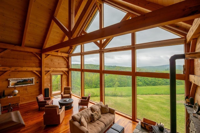 938 Stigers Rd, Andover, VT 05143 - living room featuring wood walls, high vaulted ceiling, wood finished floors, and wood ceiling with exposed beams