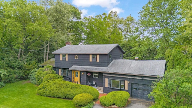 3 Timber Ln, Merrimack, NH 03054 - view of front of home featuring a chimney, an attached garage, a front lawn, and a shingled roof