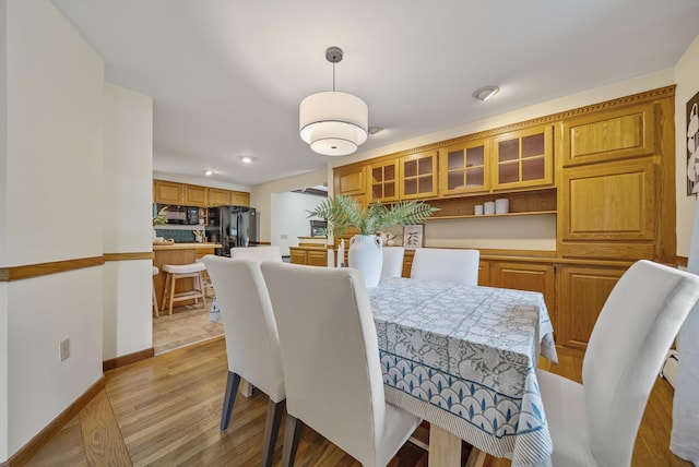 3 Timber Ln, Merrimack, NH 03054 - dining room with light wood-type flooring, recessed lighting, and baseboards