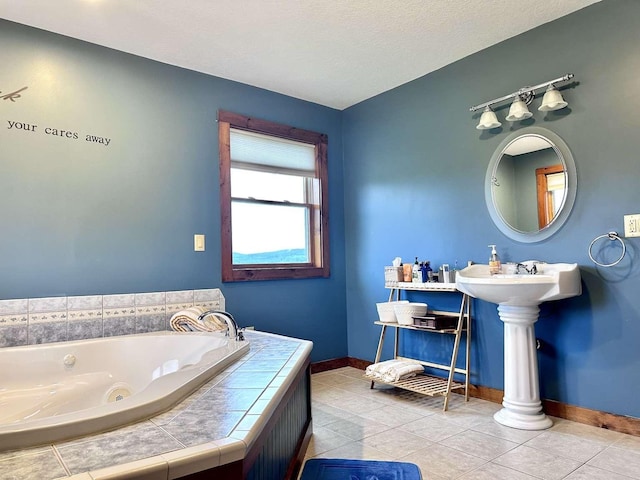 2522 Number 12 Rd, Newport City, VT 05857 - bathroom with a whirlpool tub, tile patterned flooring, and baseboards