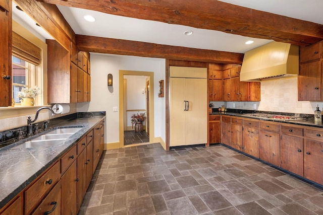 74 Bartlett Rd, Barnstead, NH 03225 - kitchen with premium range hood, a sink, beamed ceiling, baseboards, and dark stone finish flooring