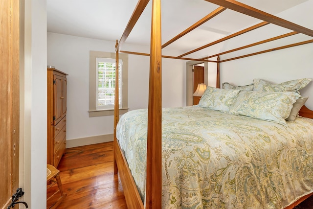 74 Bartlett Rd, Barnstead, NH 03225 - bedroom featuring hardwood / wood-style floors and baseboards