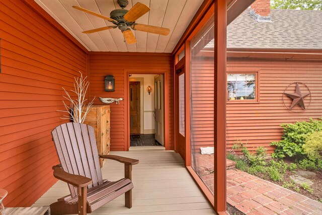 74 Bartlett Rd, Barnstead, NH 03225 - doorway to property featuring a ceiling fan, roof with shingles, and a chimney