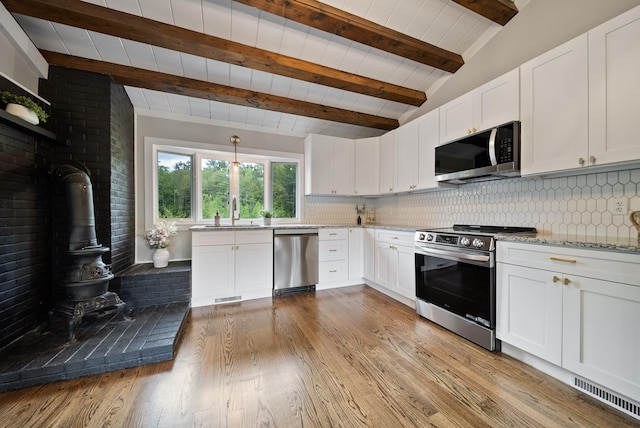 753 Sanborn Rd, Sanbornton, NH 03269 - kitchen featuring appliances with stainless steel finishes, a sink, tasteful backsplash, and light stone countertops