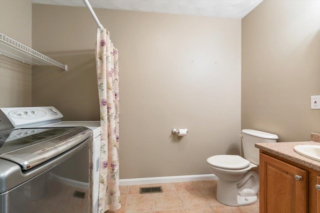 10 Hadleigh Rd, Windham, NH 03087 - full bathroom with washer and dryer, vanity, toilet, curtained shower, and baseboards