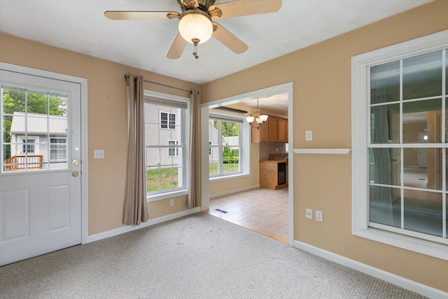 10 Hadleigh Rd, Windham, NH 03087 - doorway featuring a chandelier, healthy amount of natural light, light colored carpet, and baseboards