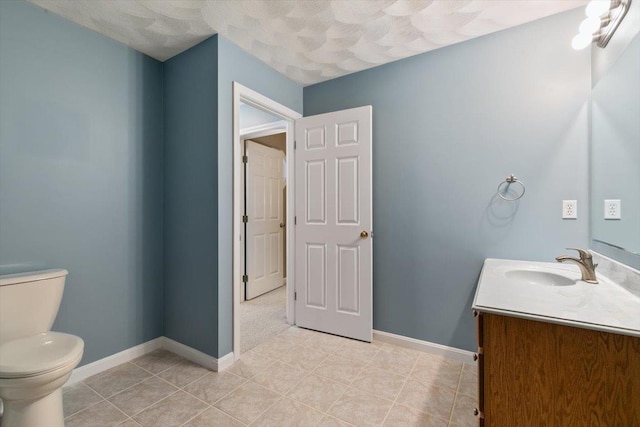 10 Hadleigh Rd, Windham, NH 03087 - bathroom featuring vanity, toilet, tile patterned floors, and baseboards