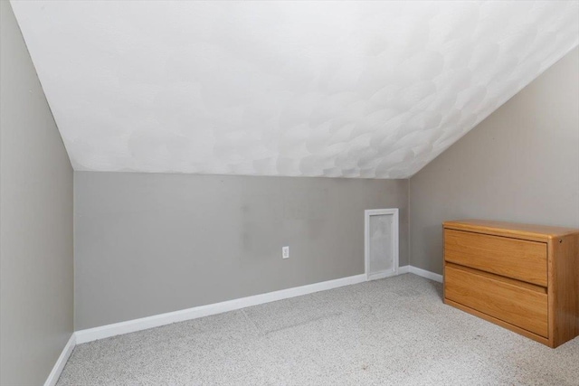 10 Hadleigh Rd, Windham, NH 03087 - additional living space featuring vaulted ceiling, light carpet, and baseboards