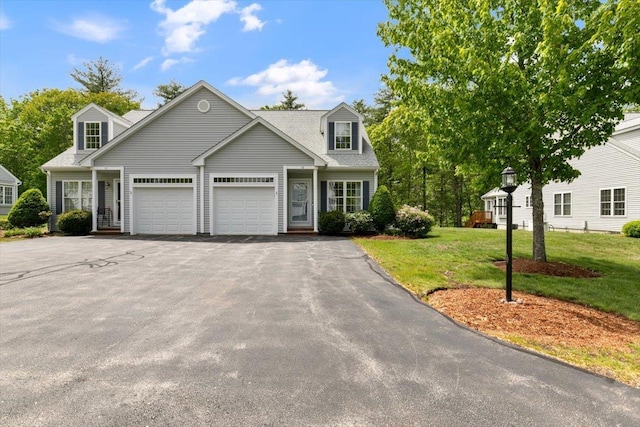 10 Hadleigh Rd, Windham, NH 03087 - view of front of home featuring an attached garage, a front yard, and driveway