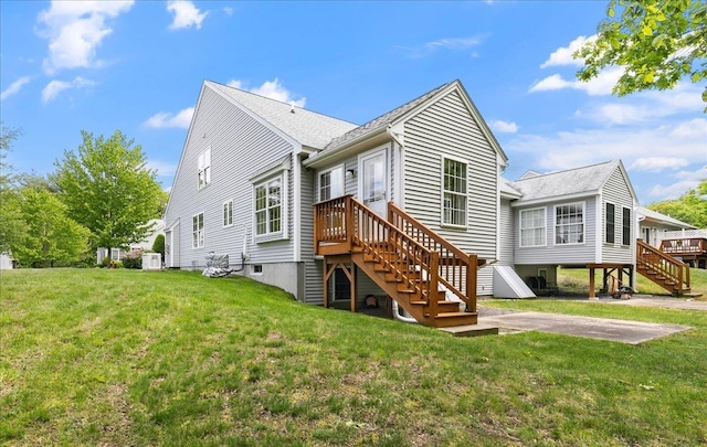 10 Hadleigh Rd, Windham, NH 03087 - back of house with stairway, a lawn, central air condition unit, and a patio area