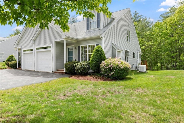 10 Hadleigh Rd, Windham, NH 03087 - cape cod-style house with driveway, a garage, a shingled roof, and a front lawn