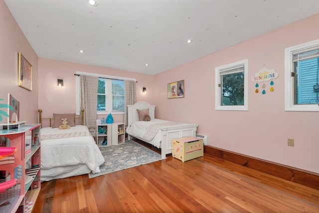 47 Foch St, Manchester, NH 03104 - bedroom featuring wood finished floors, baseboard heating, and recessed lighting