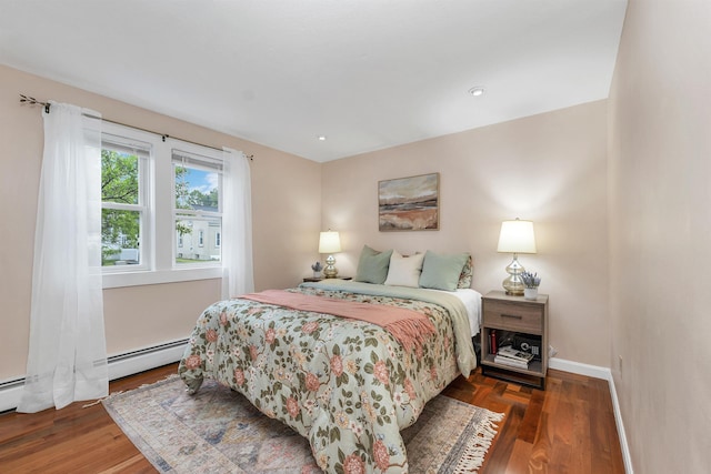 47 Foch St, Manchester, NH 03104 - bedroom featuring wood finished floors, baseboards, and baseboard heating