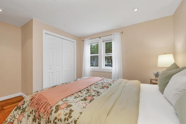 47 Foch St, Manchester, NH 03104 - bedroom with wood finished floors, baseboards, recessed lighting, and a closet