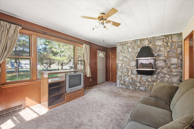 129 Camp Kiniya Rd, Colchester, VT 05446 - living area featuring carpet flooring, a ceiling fan, and wood walls