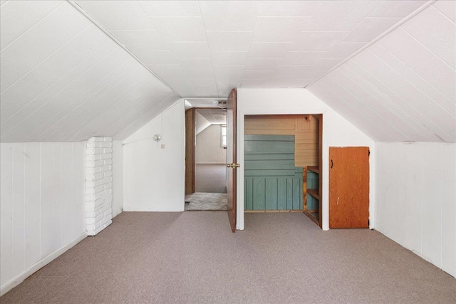 129 Camp Kiniya Rd, Colchester, VT 05446 - bonus room featuring carpet, lofted ceiling, and wood walls