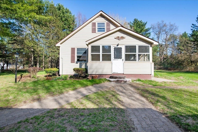 129 Camp Kiniya Rd, Colchester, VT 05446 - bungalow with a front yard