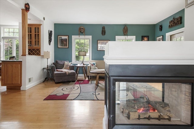 26 Pinnacle Dr, South Burlington, VT 05403 - living area featuring plenty of natural light, light wood-type flooring, and baseboards