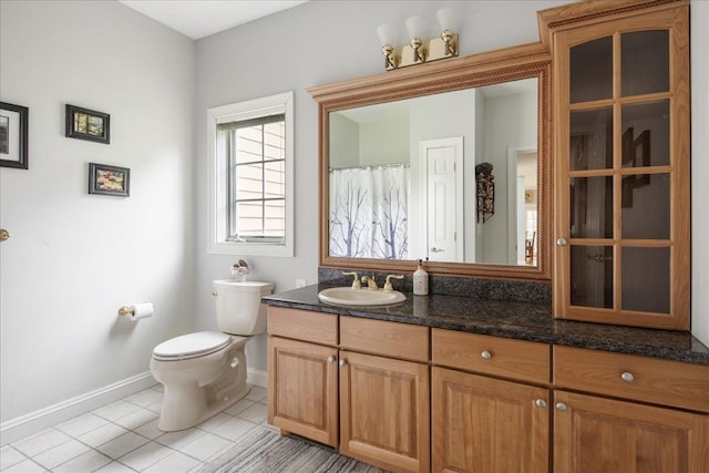 26 Pinnacle Dr, South Burlington, VT 05403 - full bath with toilet, vanity, baseboards, and tile patterned floors