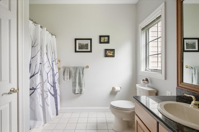 26 Pinnacle Dr, South Burlington, VT 05403 - bathroom with vanity, toilet, plenty of natural light, and tile patterned floors