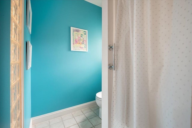 26 Pinnacle Dr, South Burlington, VT 05403 - full bath with tile patterned flooring, toilet, baseboards, and curtained shower