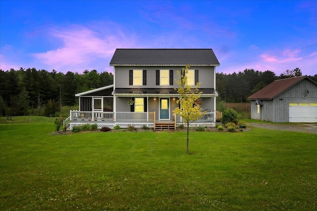 3352 Watertower Rd, Berkshire, VT 05450 - farmhouse featuring covered porch, an outbuilding, a yard, a detached garage, and dirt driveway