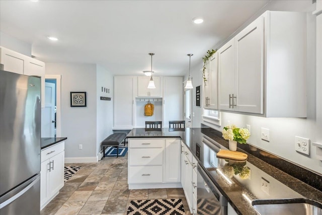 3352 Watertower Rd, Berkshire, VT 05450 - kitchen featuring appliances with stainless steel finishes, white cabinets, hanging light fixtures, recessed lighting, and baseboards