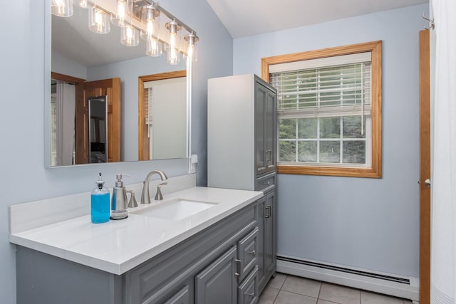27 Grafton Dr, Bedford, NH 03110 - bathroom featuring baseboard heating, vanity, and tile patterned floors