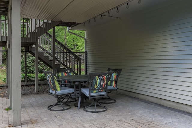 27 Grafton Dr, Bedford, NH 03110 - view of patio / terrace with stairs and outdoor dining space