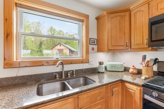 174 Sky View Rd, Stratford, NH 03590 - kitchen featuring a sink, stainless steel range with gas cooktop, and dark stone counters