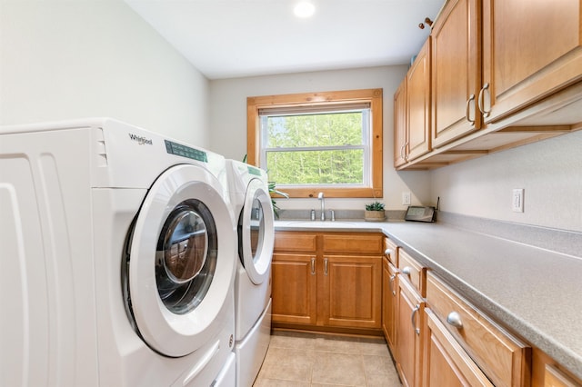 174 Sky View Rd, Stratford, NH 03590 - washroom with cabinet space, independent washer and dryer, and light tile patterned floors