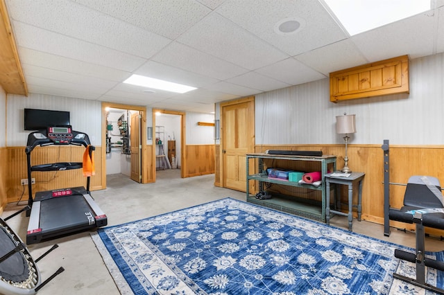 174 Sky View Rd, Stratford, NH 03590 - exercise area featuring wood walls, a paneled ceiling, and a wainscoted wall