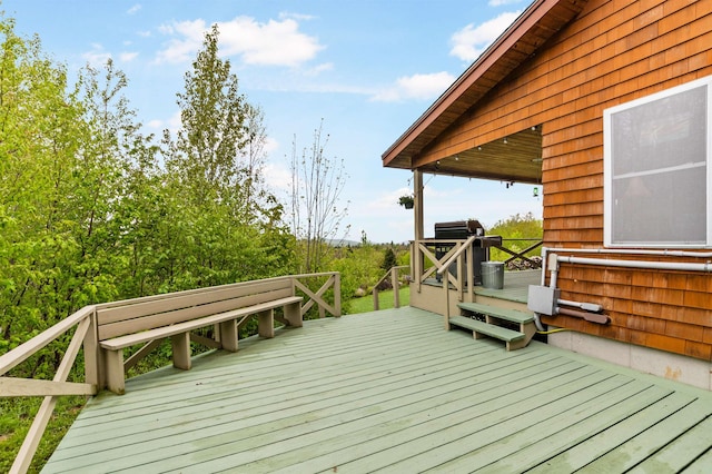 174 Sky View Rd, Stratford, NH 03590 - wooden terrace with a grill