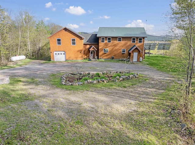 174 Sky View Rd, Stratford, NH 03590 - back of property featuring dirt driveway and a garage
