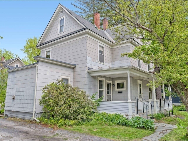 27 Ridge St, Montpelier, VT 05602 - view of front of property with a porch and a chimney