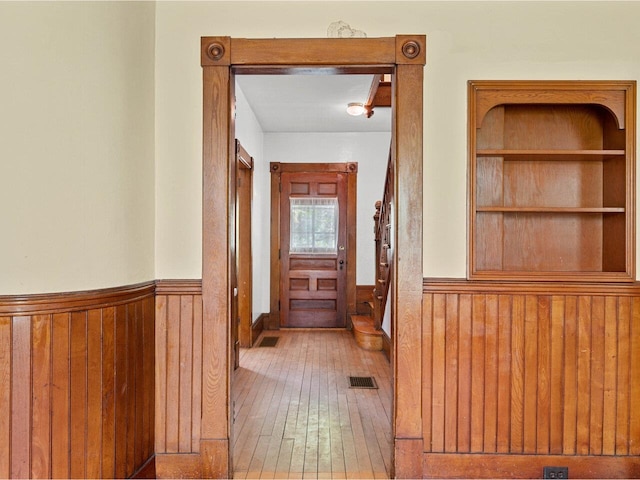 27 Ridge St, Montpelier, VT 05602 - hallway with wainscoting, hardwood / wood-style floors, and wood walls
