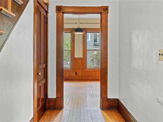 27 Ridge St, Montpelier, VT 05602 - hallway with light wood-style floors, baseboards, and a wainscoted wall