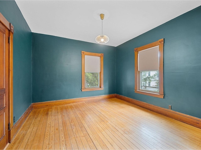 27 Ridge St, Montpelier, VT 05602 - unfurnished room featuring healthy amount of natural light, light wood-type flooring, and baseboards