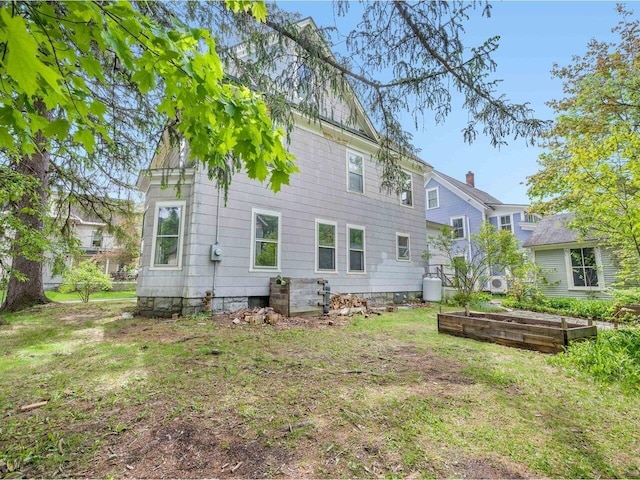 27 Ridge St, Montpelier, VT 05602 - back of house featuring a garden and a yard