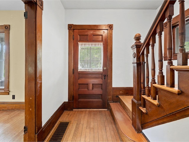 27 Ridge St, Montpelier, VT 05602 - entrance foyer featuring light wood finished floors and stairs