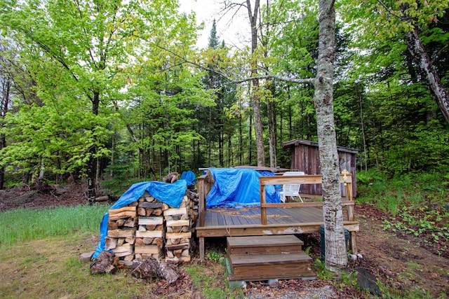 364 Spaulding Rd, Saint Johnsbury, VT 05819 - view of yard with a deck and a wooded view