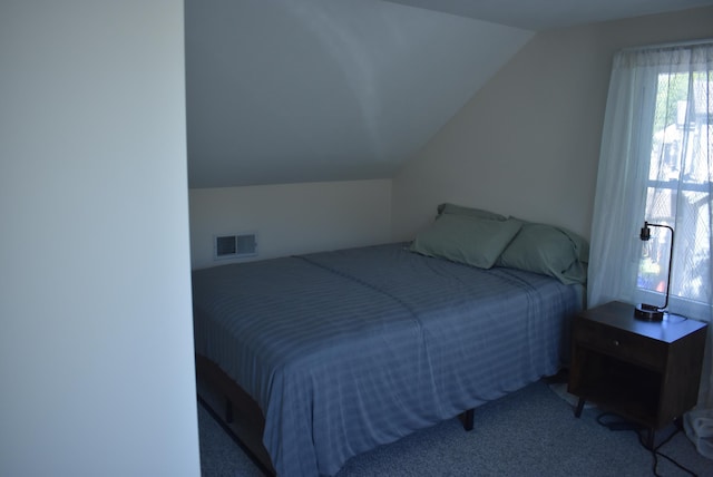 11 Creighton St, Newmarket, NH 03857 - carpeted bedroom featuring vaulted ceiling and multiple windows