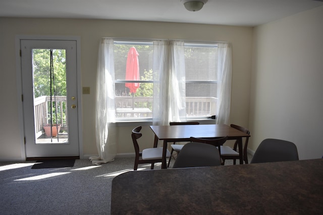 11 Creighton St, Newmarket, NH 03857 - carpeted dining space with baseboards