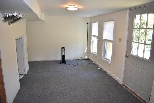 11 Creighton St, Newmarket, NH 03857 - carpeted empty room featuring healthy amount of natural light and baseboards