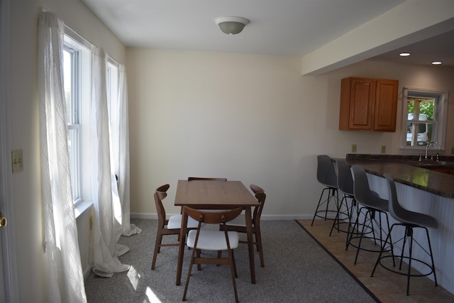 11 Creighton St, Newmarket, NH 03857 - dining room featuring baseboards, light colored carpet, and recessed lighting