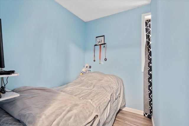19 Overland St, Laconia, NH 03246 - bedroom featuring wood finished floors and baseboards