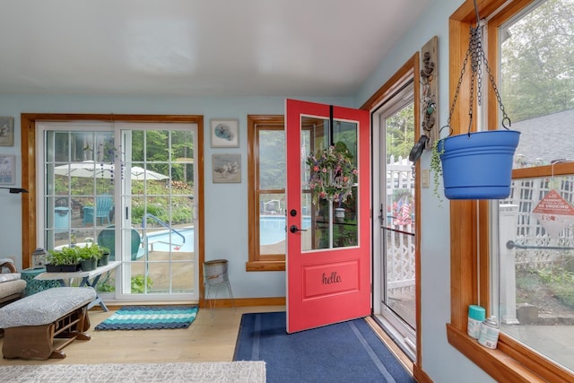 110 Nh Dr, Webster, NH 03303 - foyer with wood finished floors and baseboards