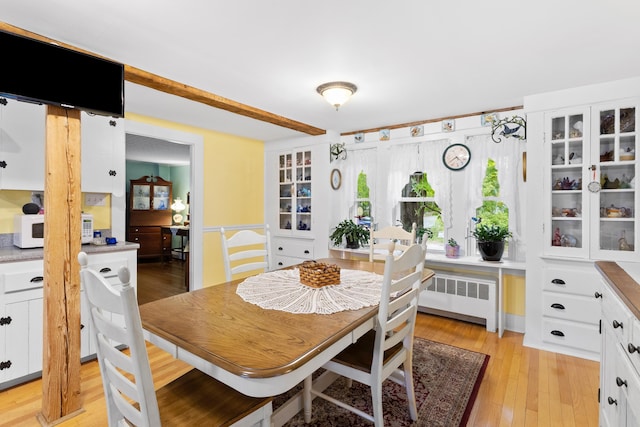 166 New Boston Rd, Goffstown, NH 03045 - dining room with radiator and light wood-style floors